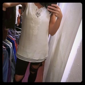 Sleeveless long embroidered blouse